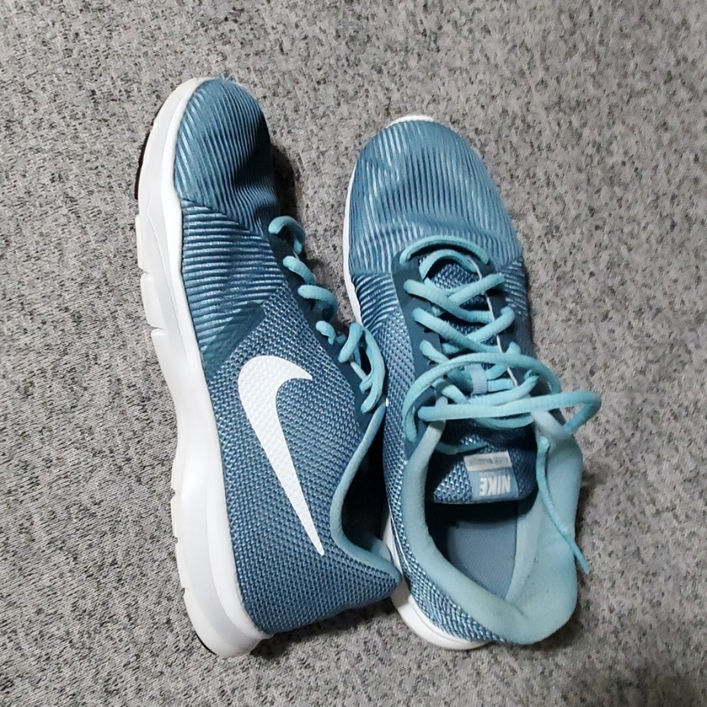 Blue nike athletic shoes